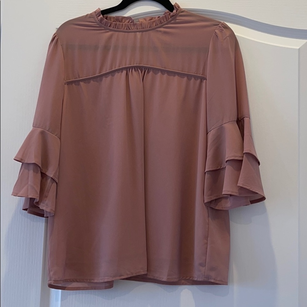 Mauve colored blouse